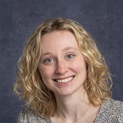 Myah Rolf in a professional headshot.